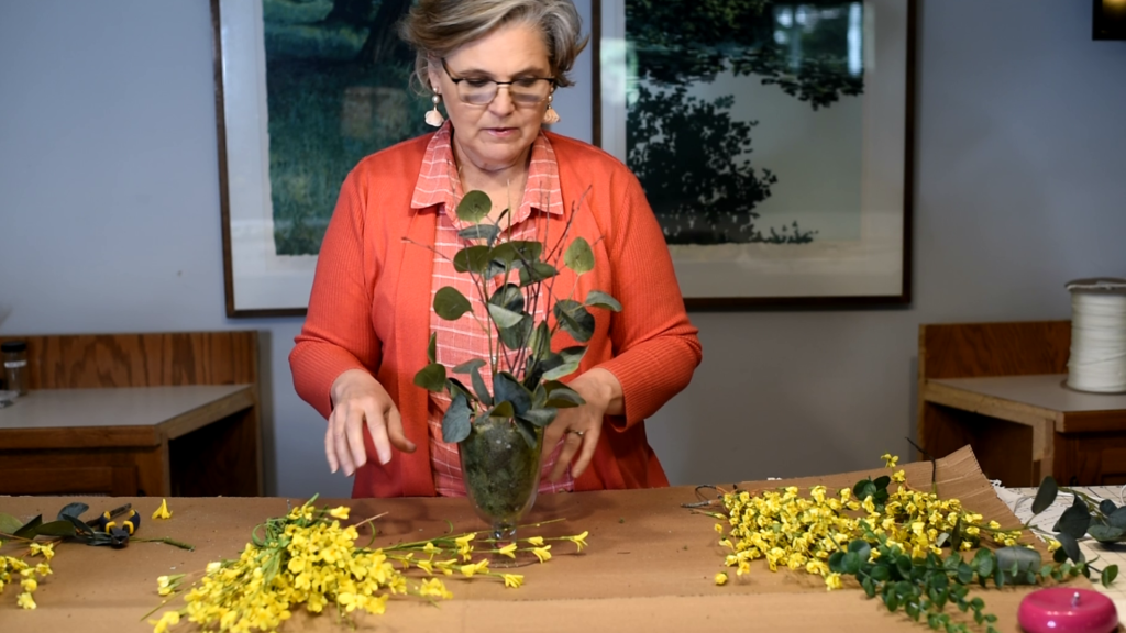 Sandra working on floral arrangement