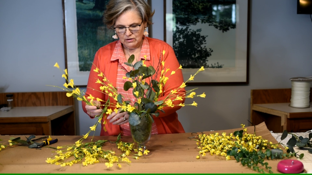 Sandra working on adding flowers