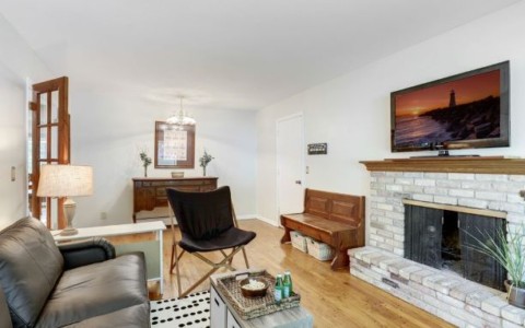 Create a room where buyers can imagine their family enjoying a movie and playing games together.